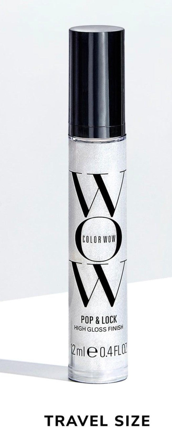 Color Wow Pop & Lock High Gloss Shellac bottle with vibrant shine and polished finish for taming frizz and smoothing hair texture in a compact travel size